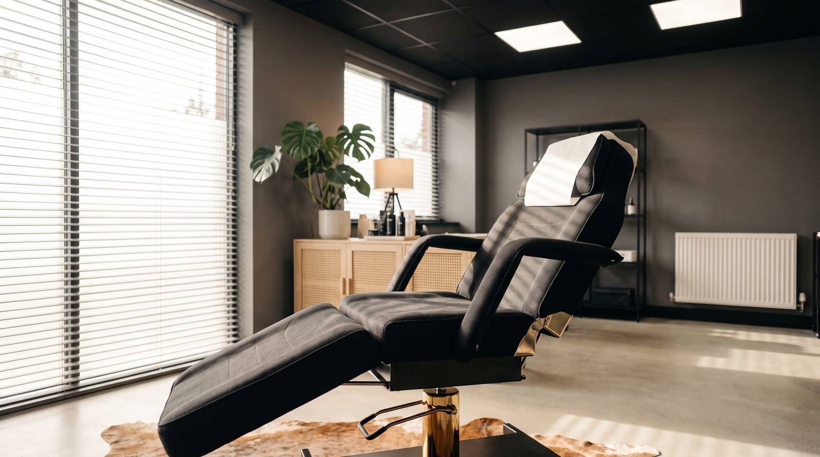 The calm empty consultation corner at Kennedy SMP Studio in Haverhill, the reclined chair ready for an honest conversation about whether a hair tattoo suits you