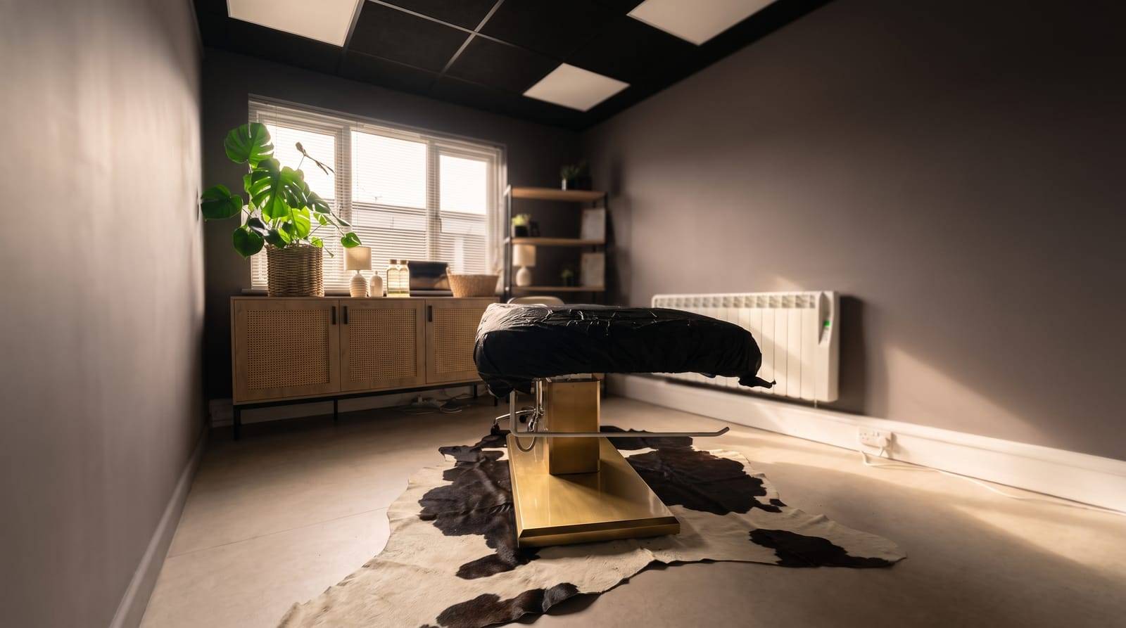 The calm, fully-equipped treatment studio at Kennedy SMP Studio in Haverhill
